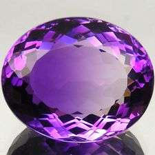 HUGE & so gorgeous! 31.48 cts Natural BI-COLOUR AMETHYST oval facet (Bolivia)