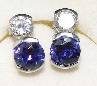 Created TANZANITE and DIAMONDS set in Sterling Silver