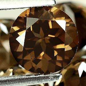 Natural SMOKY QUARTZ 7.1mm round facets (Brazil) - 2 pieces available