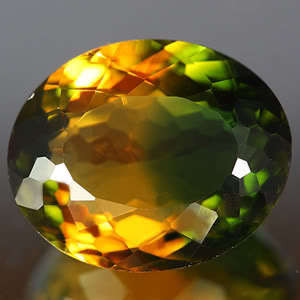 Impressive gem! 18.20 cts Natural BI-COLOUR QUARTZ oval facet (Africa)