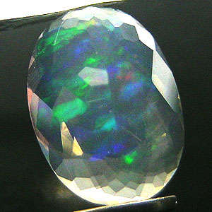Magnificent colour flashes! 1.16 cts Natural SUDANESE FIRE OPAL oval facet (Sudan)