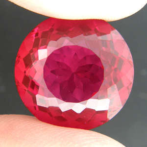 PRICE REDUCED! 26.68 cts 18.15mm RASPBERRY RED TOPAZ round facet (Brazil)