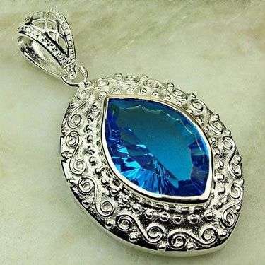 BLUE TOPAZ set in 925 Sterling Silver (pendant)