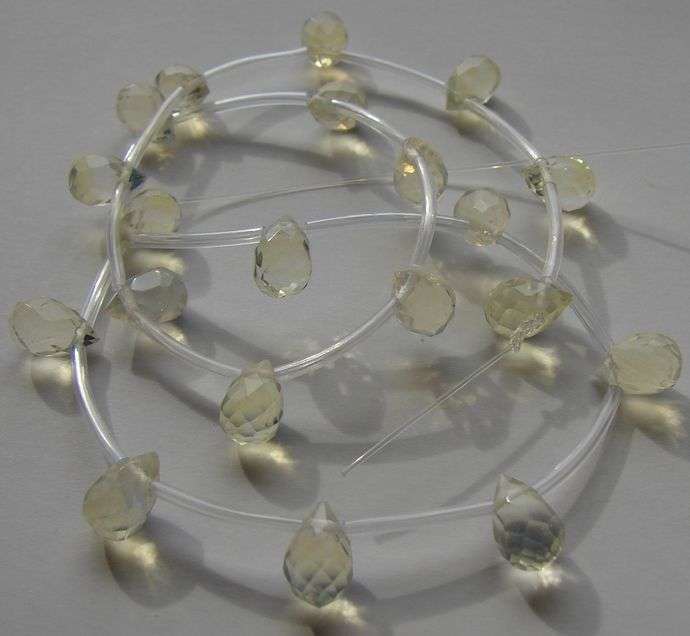 Drilled yellow OPALITE briolette facets