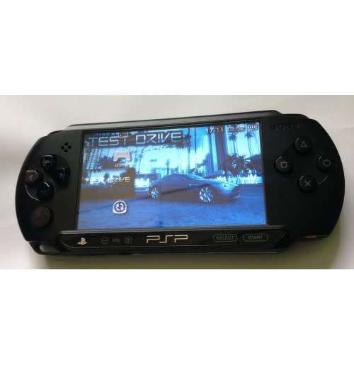 PSP STREET WITH 2GB MEMORY CARD AND CHARGER WITH GAMES- GREAT DEALS!!