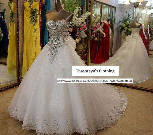 Royal Wedding Dress with Sequined Tulle Skirt Cathedral Train Wedding Dress with Bow
