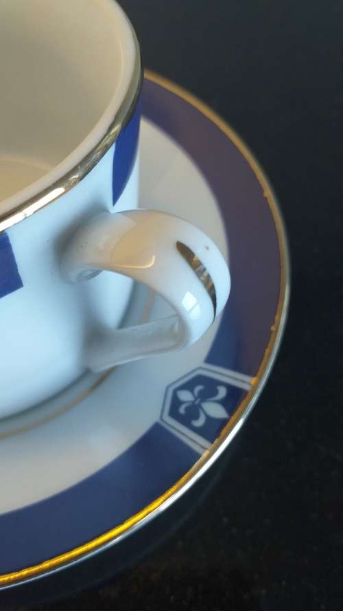 `TRISA R - Blue First` China set of 4 Demitasse cup and saucers - White, Cobalt blue with gold trim!