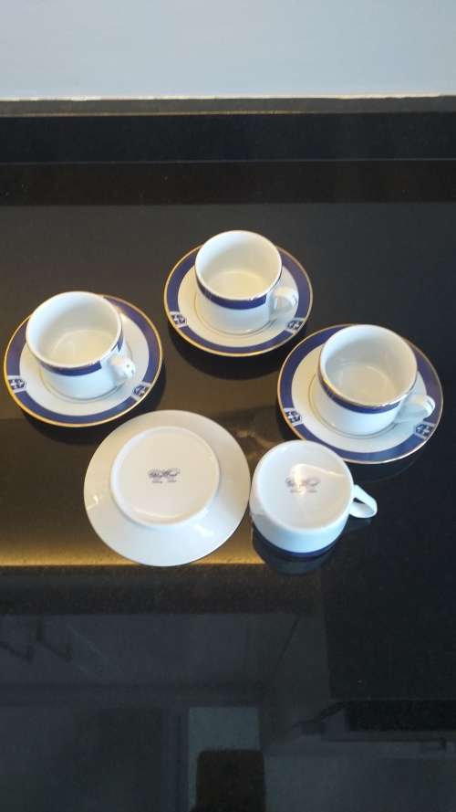 `TRISA R - Blue First` China set of 4 Demitasse cup and saucers - White, Cobalt blue with gold trim!