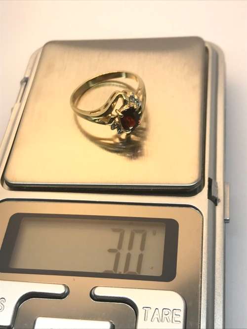 0.50CT Garnet & Diamond Ring