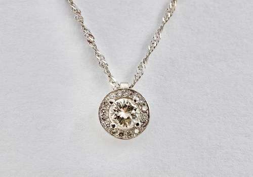 *0.80CT DIAMOND HALO PENDANT* R1 BIDS!