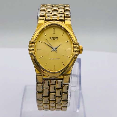 Orient quartz gold watch store
