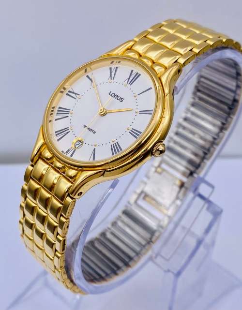 *LORUS LADIES GOLD DRESS WATCH* R1 BIDS