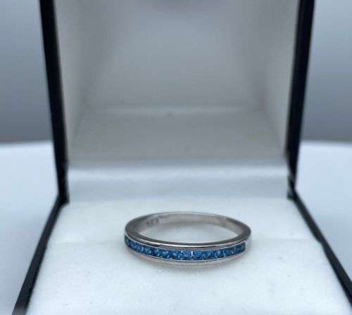 ***UNIQUE STERLING SILVER BLUE ZIRCONIA ETERNITY RING*** R1 BIDS!!!