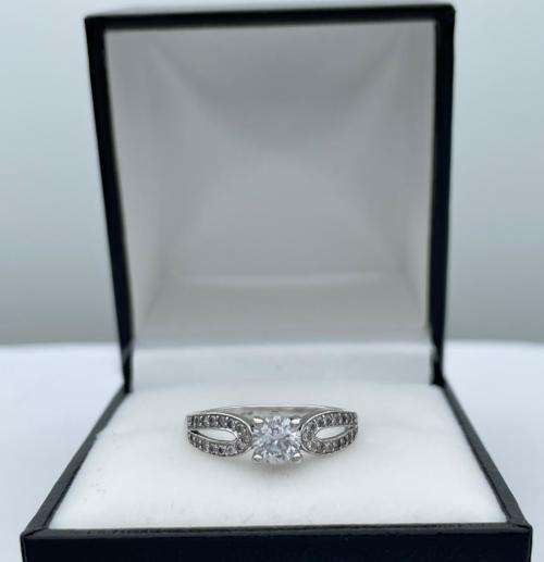***DAZZLING STERLING SILVER CZ ETERNITY RING* R1 BIDS