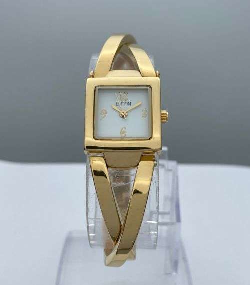 ***NEW LATAN GOLD LADIES CROSSOVER DRESS WATCH***R1 BIDS!