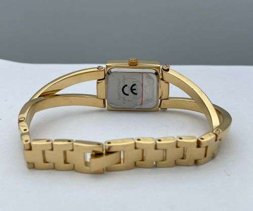 ***NEW LATAN GOLD LADIES CROSSOVER DRESS WATCH***R1 BIDS!