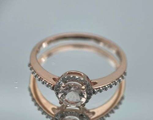RETAIL:R15000 - ROSE GOLD MORGANITE & DIAMOND HALO RING
