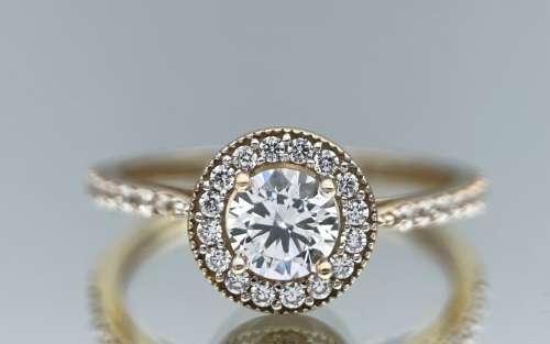 RETAIL R7000 - DAZZLING 9K HALO ETERNITY ENGAGEMENT RING