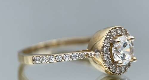 RETAIL R7000 - DAZZLING 9K HALO ETERNITY ENGAGEMENT RING