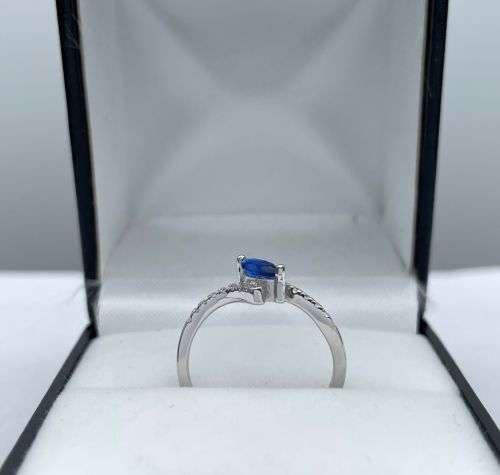 RETAIL:R2800 - BLUE SAPPHIRE CZ OFFSET ETERNITY RING!