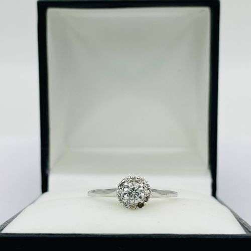 RETAIL:9500 - DAZZLING 0.35CT DIAMOND HALO ENGAGEMENT RING!