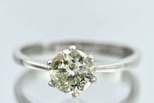STUNNING 0.70CT FANCY YELLOW DIAMOND PLATINUM SOLITAIRE RING!