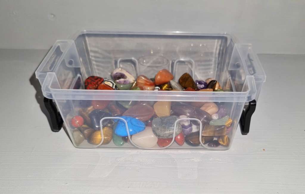 Collection of small tumbled stones ideal for jewelry making or crafting