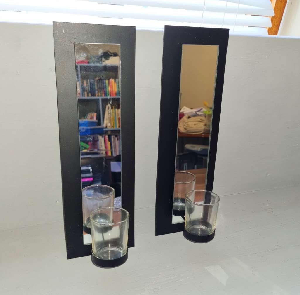 Wall mounted candle holders with mirrors