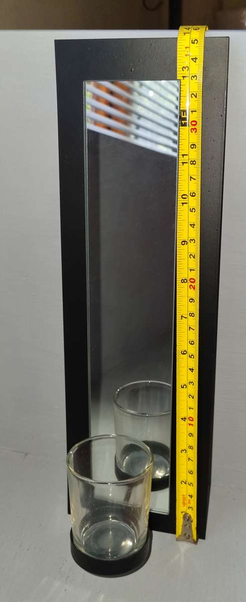 Wall mounted candle holders with mirrors