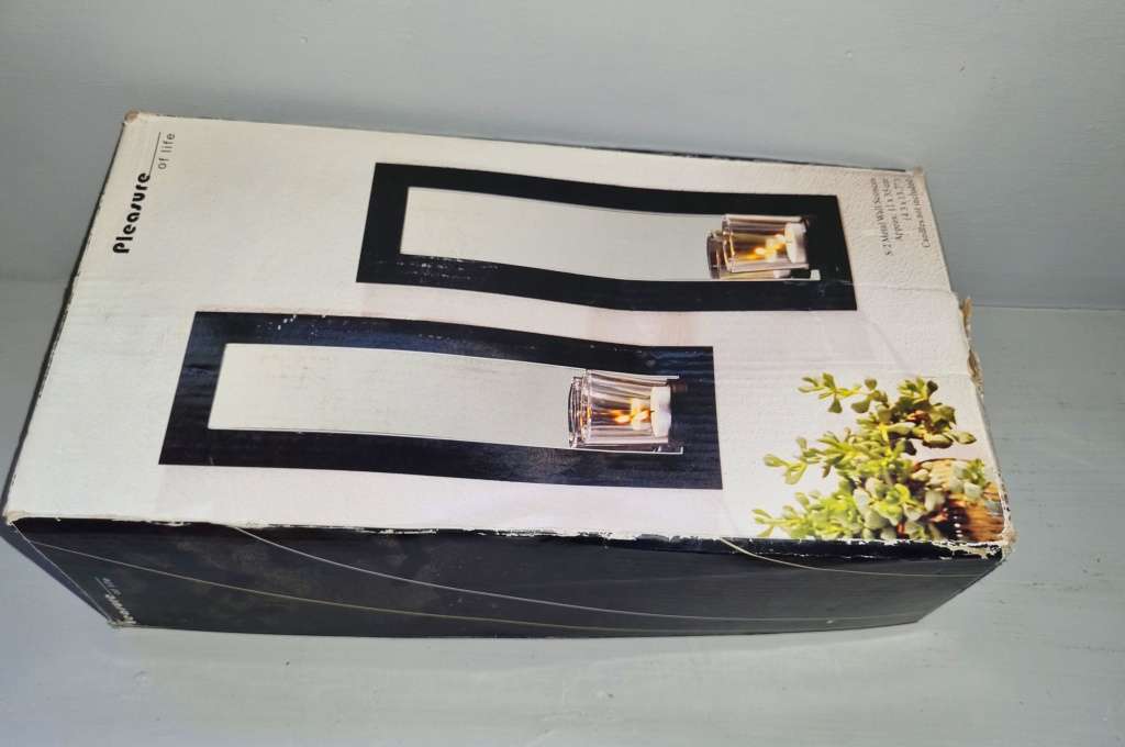 Wall mounted candle holders with mirrors