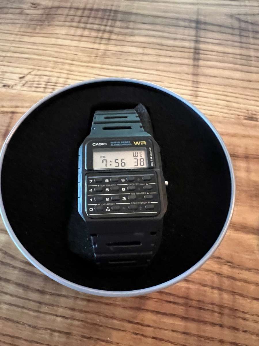 CASIO CALCULATOR WATCH - MODEL CA53W-1Z - NEW IN ORIGINAL CASE WITH MANUAL