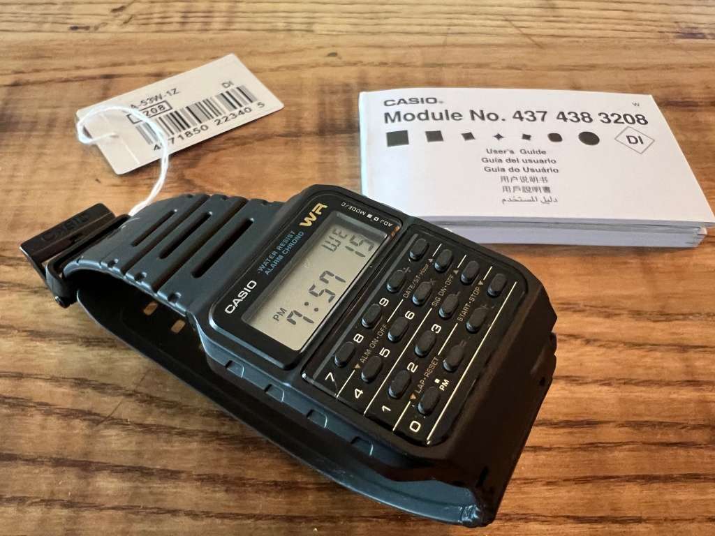 CASIO CALCULATOR WATCH - MODEL CA53W-1Z - NEW IN ORIGINAL CASE WITH MANUAL