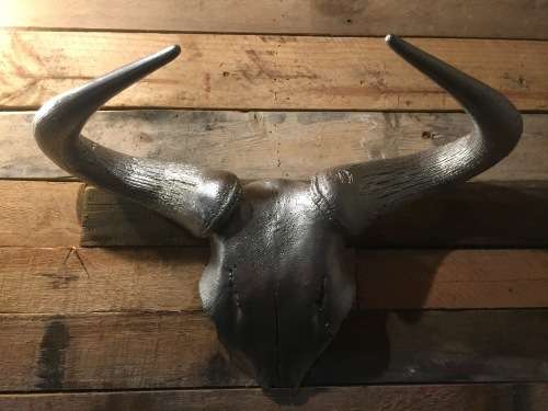 Blue-wildebeest skull, powder-coated with Gun Metal for wall decor