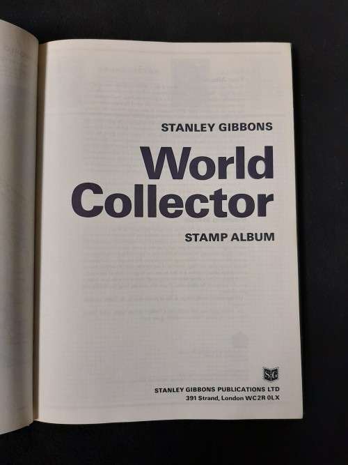 World Collector Stamp Album - Stanley Gibbons with some stamps