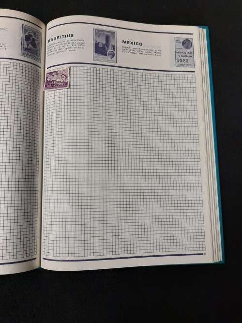 World Collector Stamp Album - Stanley Gibbons with some stamps