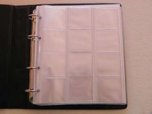 COIN ALBUM BLACK COVER  COMPLETE INCLUDING 8 ( eight) PAGES JULY SPECIAL