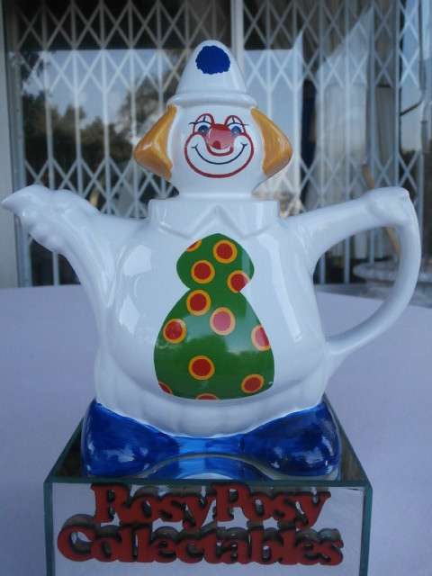 A BEAUTIFUL WADE CLOWN TEA POT IN MINT CONDITION.STAMPED UNDERNEATH