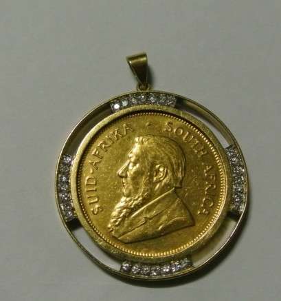Gold Kruger 1 once coin  with diamonds set in jewelry