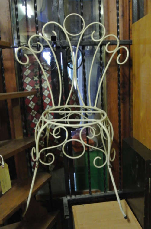 curly whirly wrought iron chair