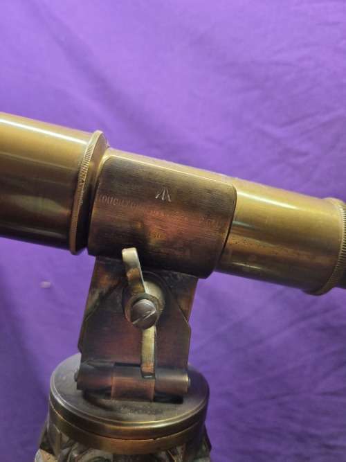 Brass telescope on wooden tripod