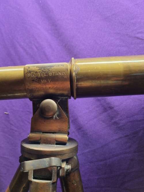 Brass telescope on wooden tripod