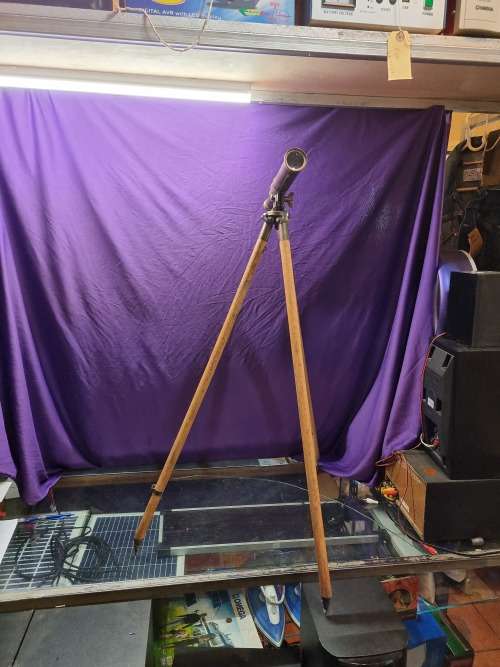 Brass telescope on wooden tripod