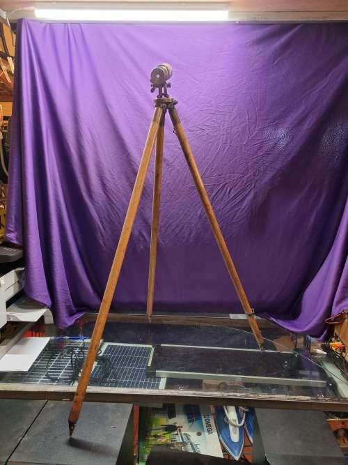 Brass telescope on wooden tripod