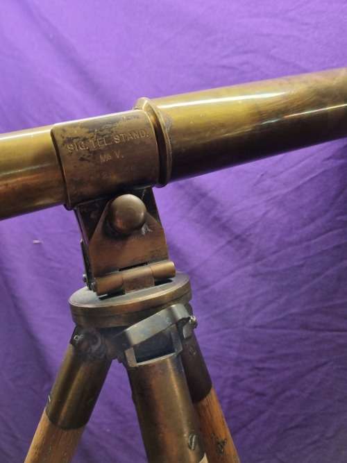 Brass telescope on wooden tripod