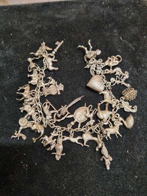 Antique silver charm bracelet