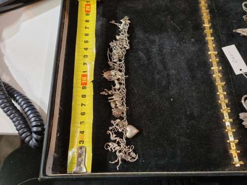 Antique silver charm bracelet