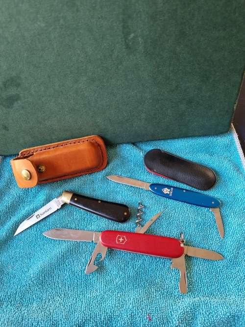 Victornox officer suisse and joseph rogers