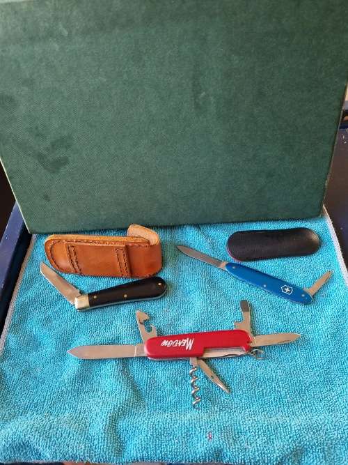 Victornox officer suisse and joseph rogers