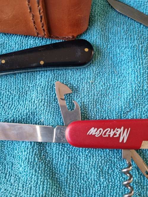 Victornox officer suisse and joseph rogers