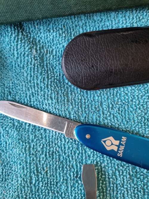 Victornox officer suisse and joseph rogers